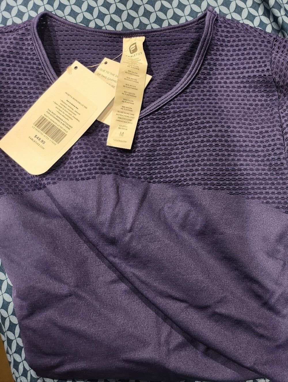 198. NWT Women’s Purple Performance Shirt